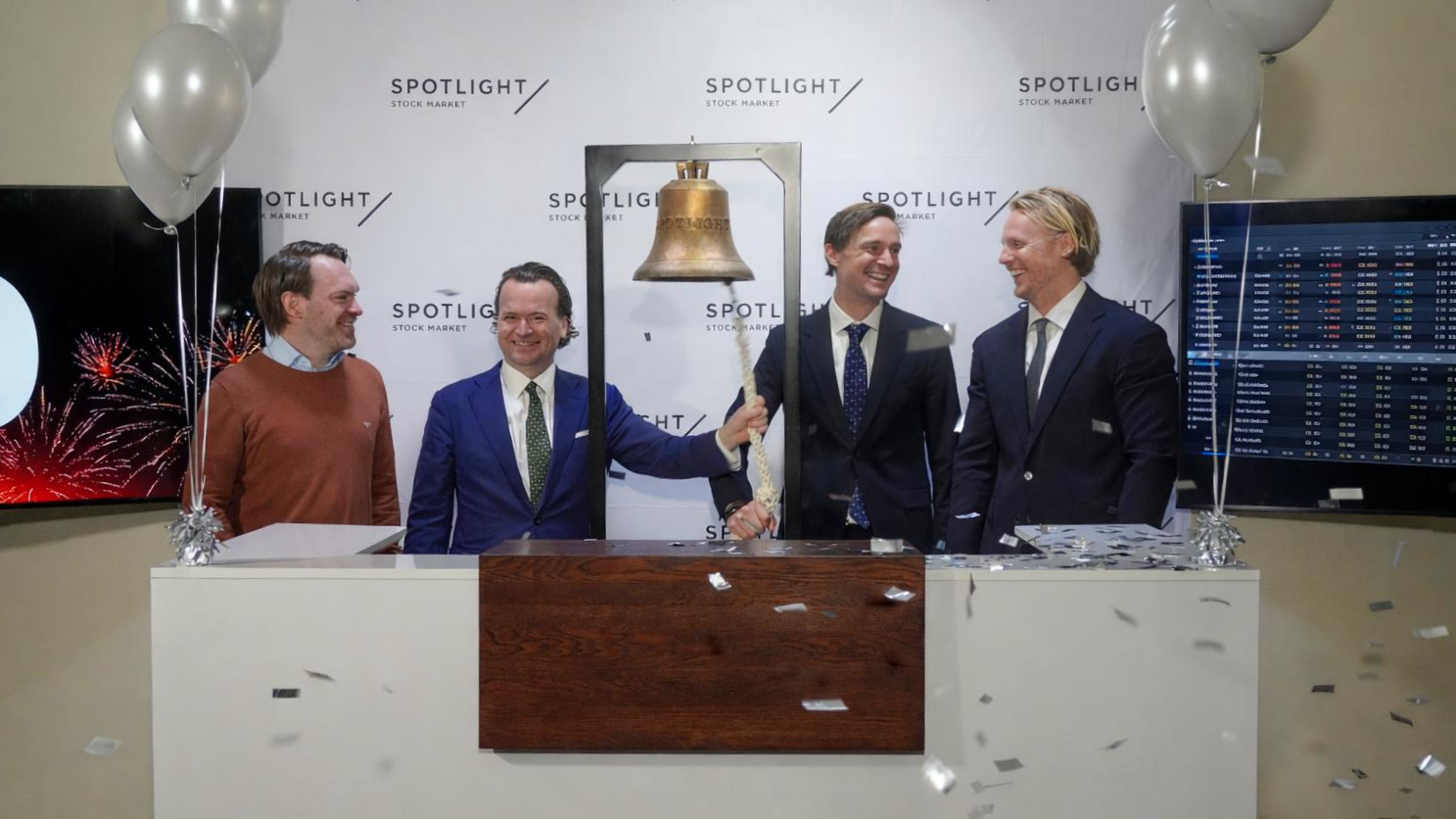 macbook pro on brown wooden table